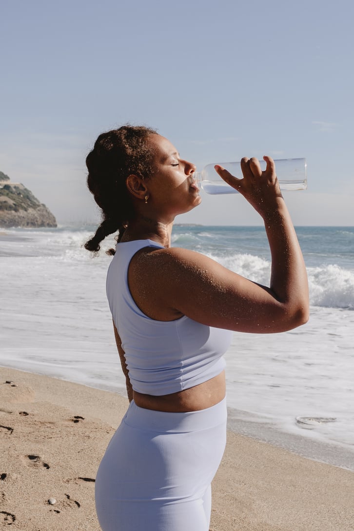 Woman in Activewear at the Beach